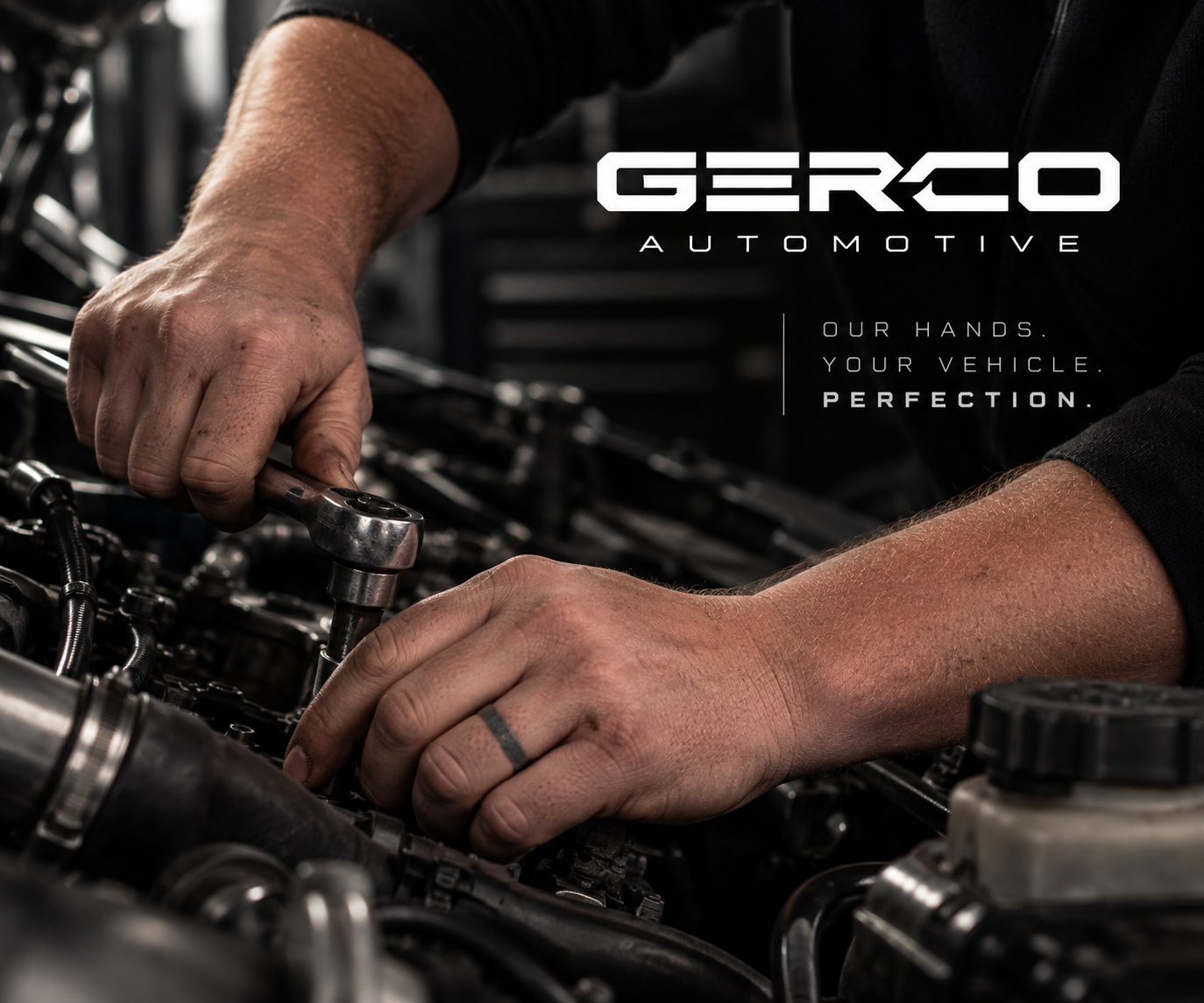 Gerco's hands working carefully on a vehicle engine